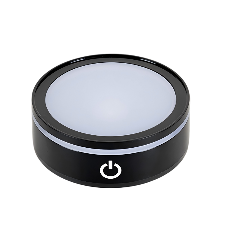 Sensitive touch control switch button on flat round black LED light pedestal